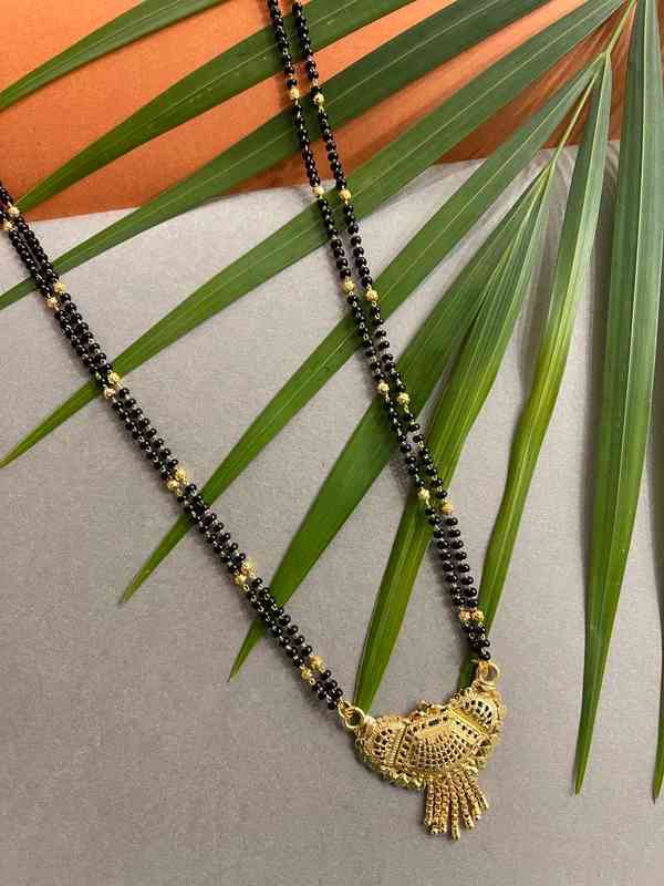 964e0f4c 8748 401f 8f9b f17a133236d01647244474428digitaldressroomgoldplatedlongmangalsutrawithblackbeadschain1.jpg